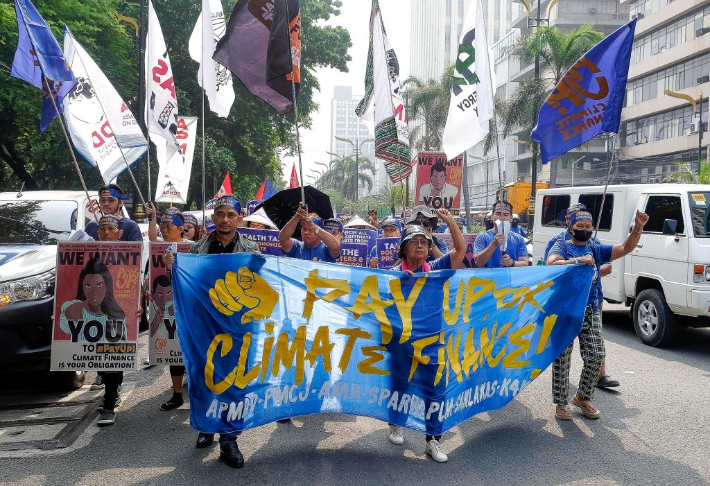 Climate activists march to U.S. Embassy to tell G7 leaders: Pay up and deliver climate finance!